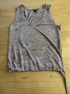 Express tank size small. Ties on side. Cute with shorts